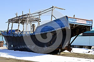 Abandoned North Korean fishing schooner on the shore of the Sea of â€Ââ€¹â€Ââ€¹Japan, Primorye, Russia.